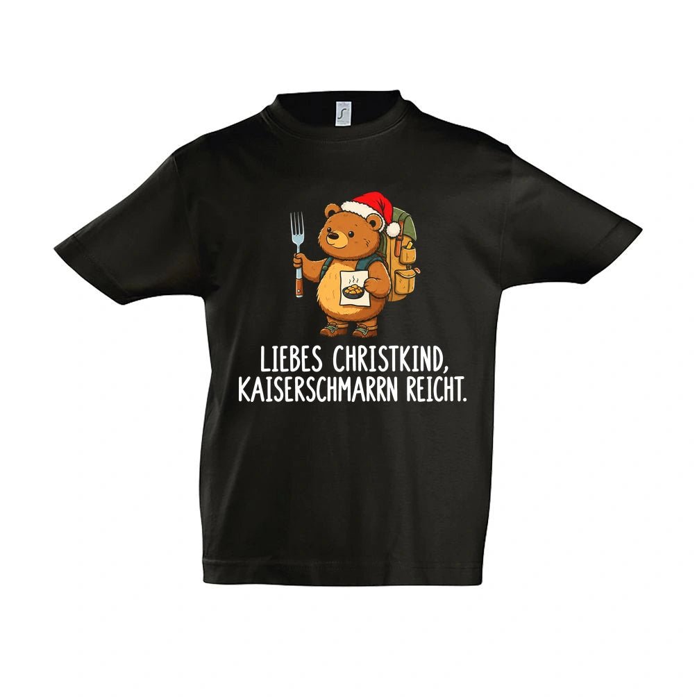 Liebes Christkind Kinder T-Shirt in Deep Black – Vorderansicht, Motiv mittig zwischen den Ärmelansätzen