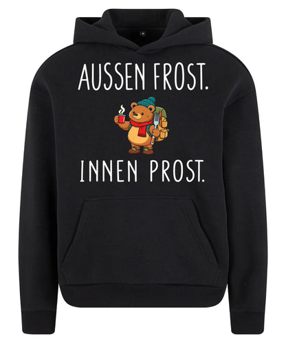 Außen Frost. Innen Prost. Hoodie in Black – Vorderansicht mit Kaiserbär-Weihnachtsmotiv