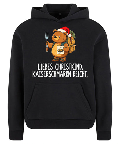 Liebes Christkind Hoodie in Black – Vorderansicht mit Kaiserbär-Weihnachtsmotiv