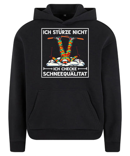 Schneequalität Hoodie in Black – Vorderansicht mit dem Motiv Schneequalität.