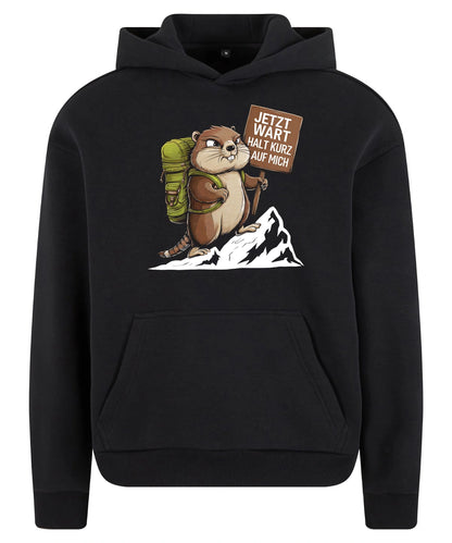 Warte kurz Hoodie in Black – Vorderansicht mit dem Motiv Warte kurz.